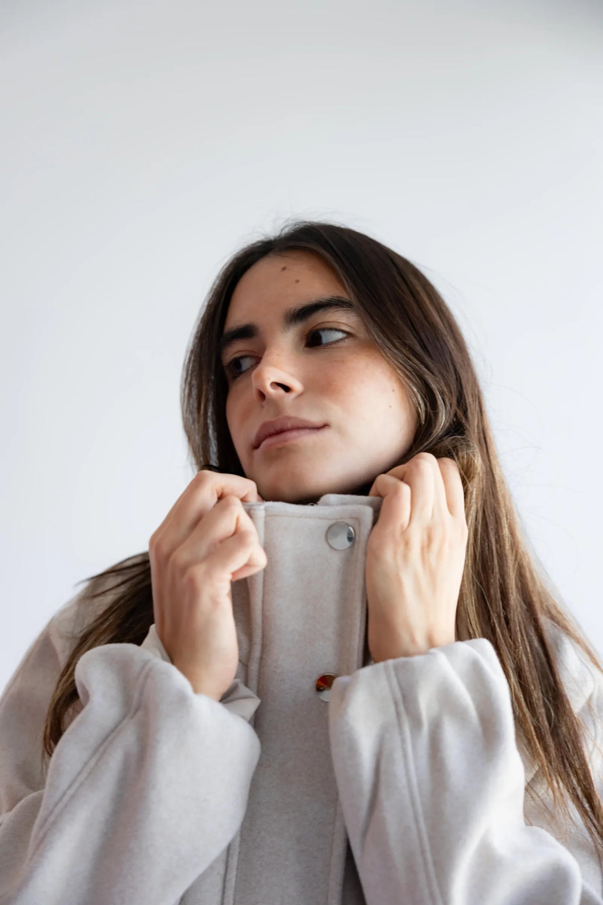 Close-up of the high funnel neck and snap buttons