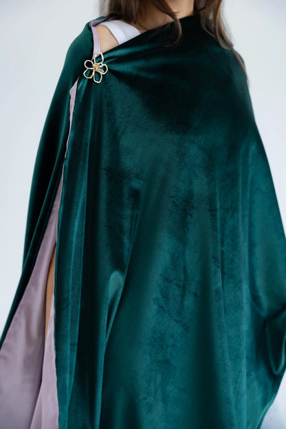 Close-up of emerald velvet and dusty pink satin lining