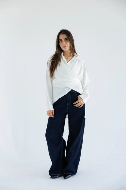 White wrap shirt with dark wide-leg jeans - full length