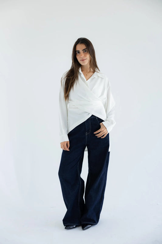 White wrap shirt with dark wide-leg jeans - full length