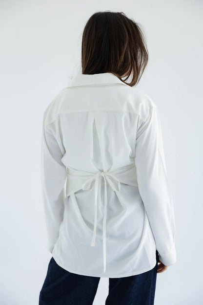 White wrap shirt - back view with tie waist