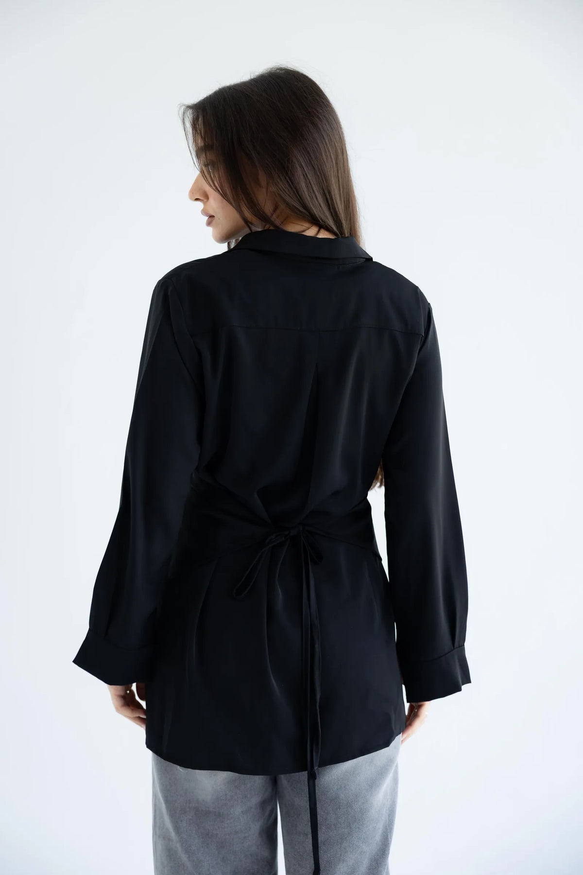 Black wrap shirt - back view with tie waist