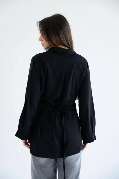 Black wrap shirt - back view with tie waist