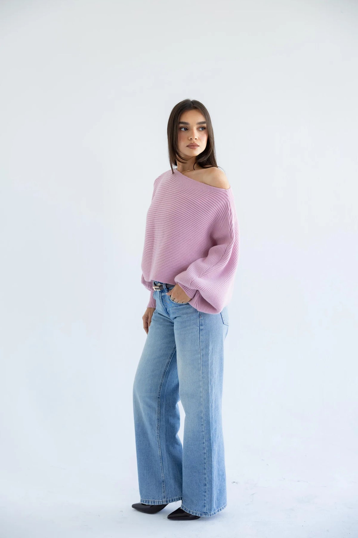 Lilac off-shoulder pullover with light-wash jeans - full length