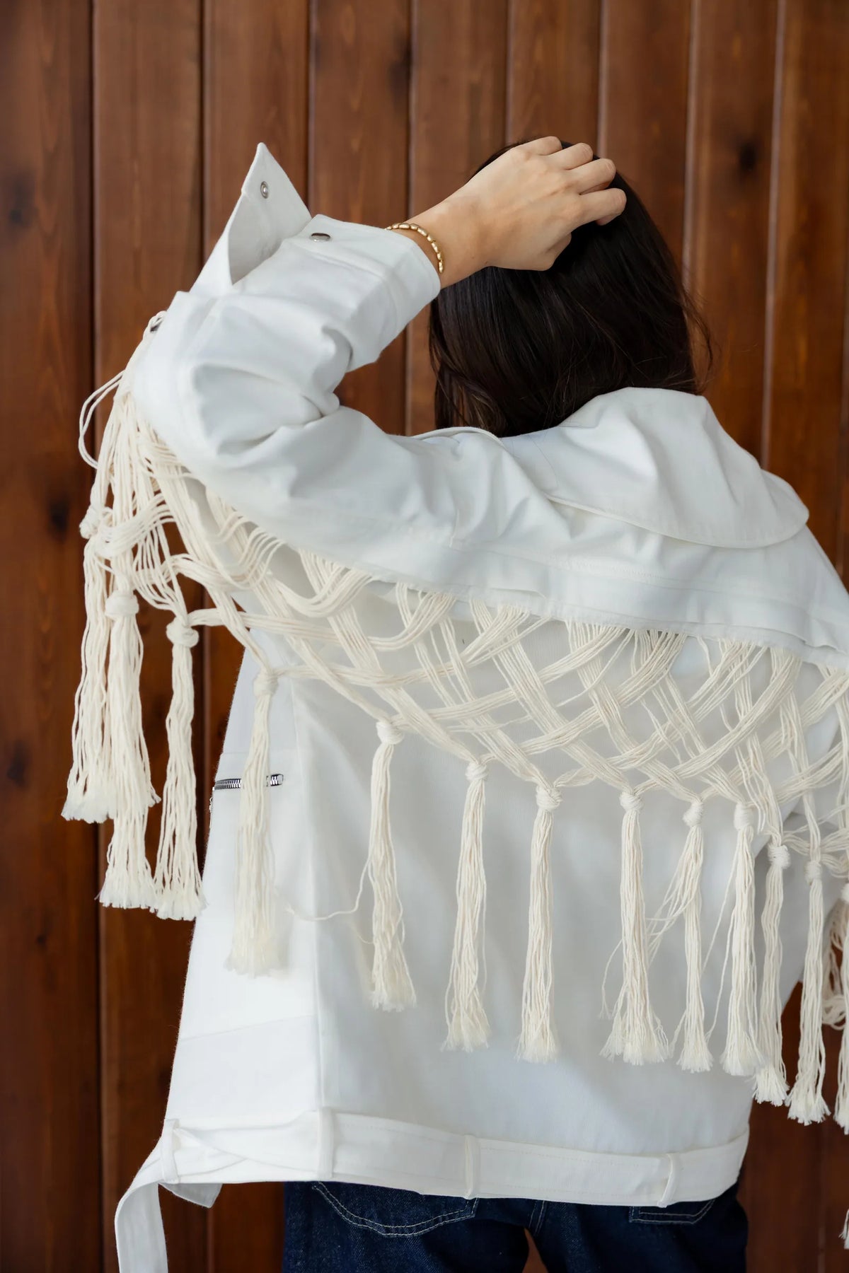 Macramé fringe jacket in motion - lifestyle shot